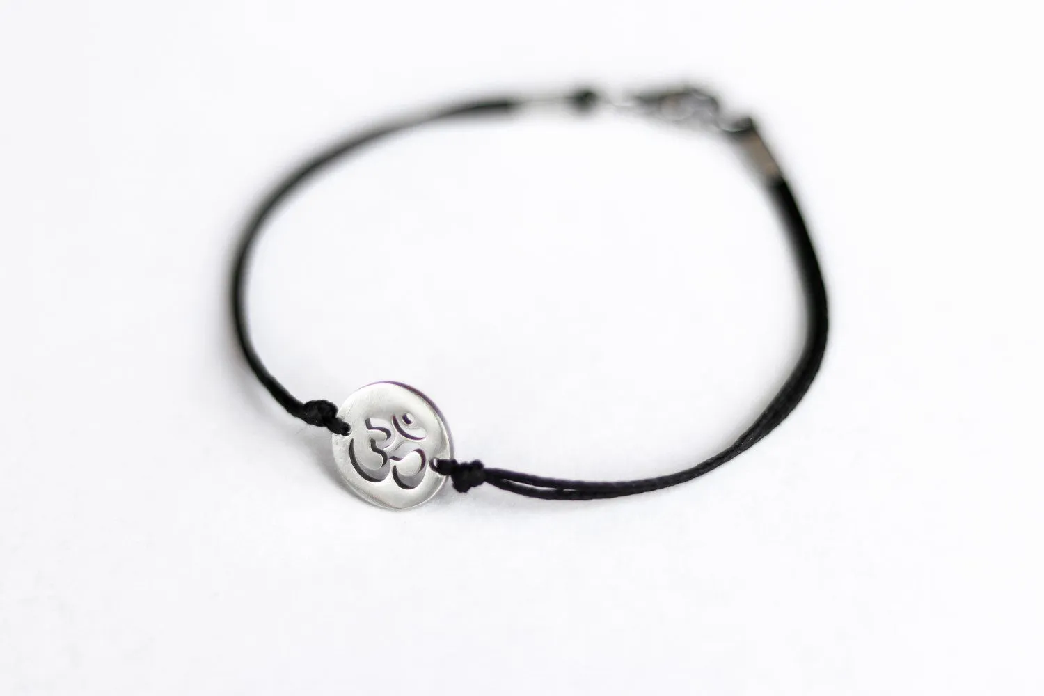 Om bracelet, waterproof bracelet, stainless steel silver Om charm, spiritual yoga jewelry, black cord, gift for her, custom size, mantra