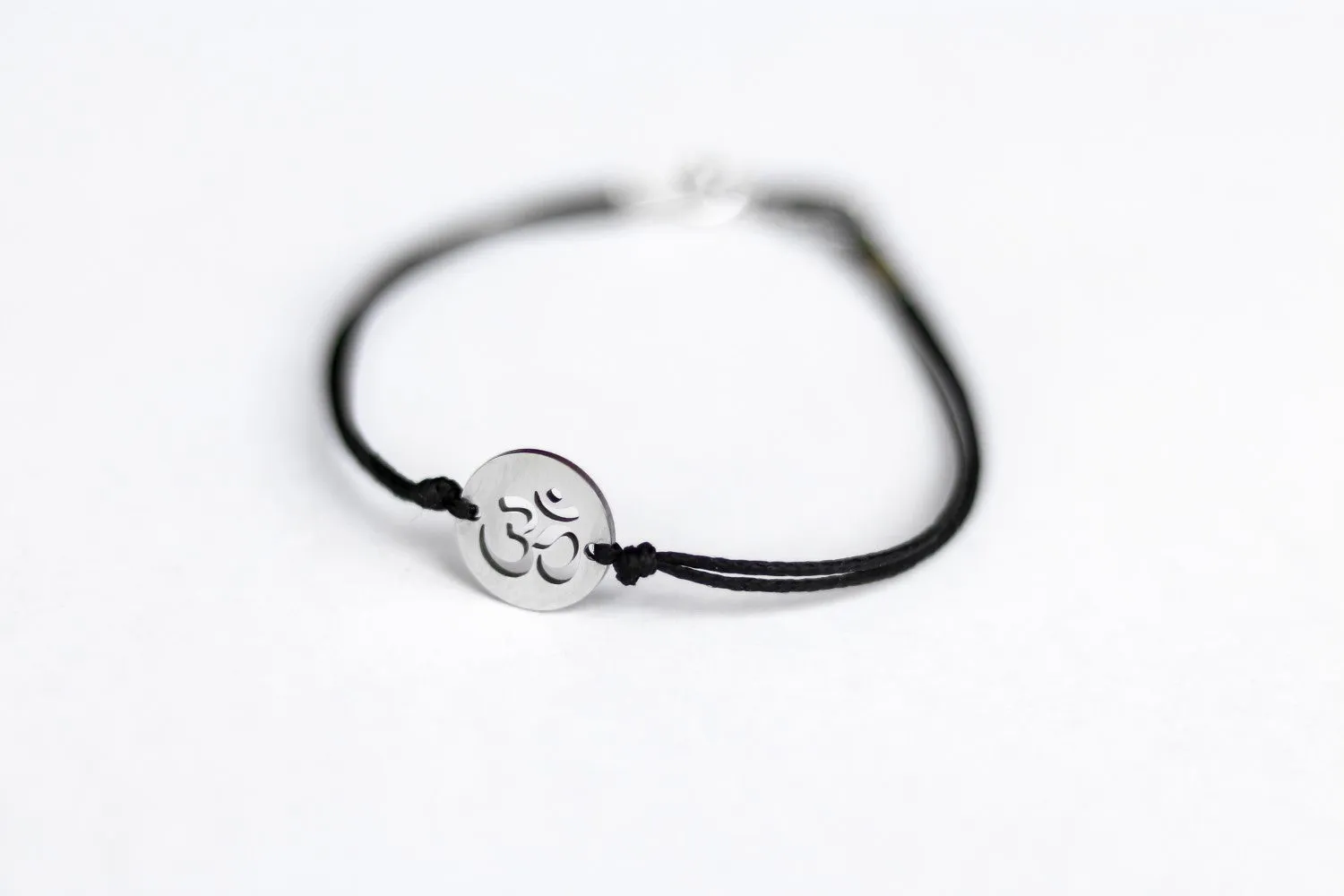 Om bracelet, waterproof bracelet, stainless steel silver Om charm, spiritual yoga jewelry, black cord, gift for her, custom size, mantra